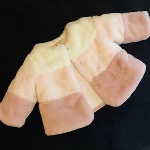 Never worn baby fur coat